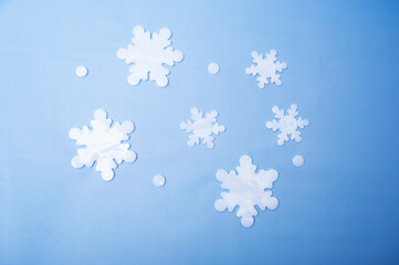 Winter background, abstract blue, snow flakes