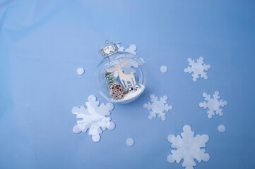 Christmas ornament on abstract blues background. Winter set