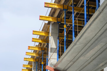 Many support and load-bearing beams and pillars on one of the levels.