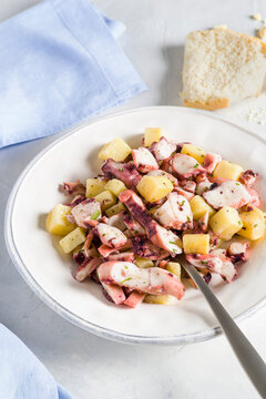 Fresh and healthy octopus salad with potatoes.  Traditional italian food.