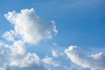Naklejka na ściany i meble Soft white clouds fluffy in the clear sky