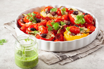 stuffed bell peppers with quinoa tomatoes olives and herb sauce chimichurri