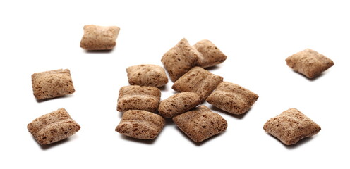 Nougat filled chocolate pillow wafers pile isolated on white background