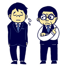 男性上司に怒られる若い男性社員