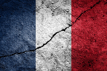 France flag on cracked concrete wall. The concept of crisis, conflict, terrorism or other problems...
