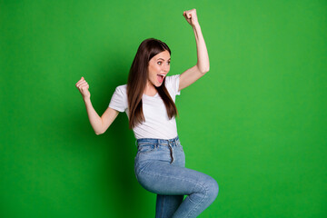 Profile photo of sweet cute girl wear casual outfit celebrating winner arms up open mouth isolated green color background