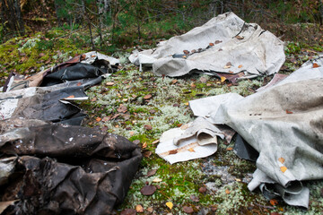 big amount of trash in forest, global environment issues