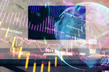 Multi exposure of chart and financial info and work space with computer background. Concept of international online trading.