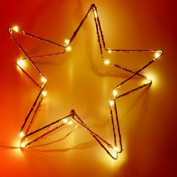 Weihnachten, farbig beleuchteter Stern, Hintergrund