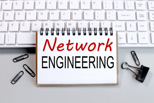 network Engineering. text on white paper on light keyboard. Conceptual photo-field associated with interworking requirements