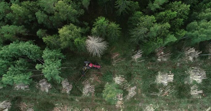 An aerial of a forest machine harvester on a clear-cut area in Estonia, Northern Europe.