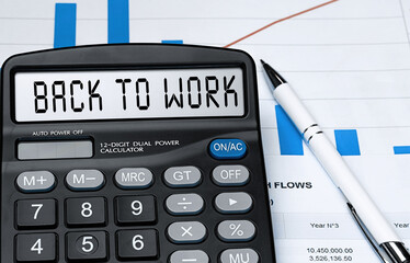 Calculator with the word BACK TO WORK on the display