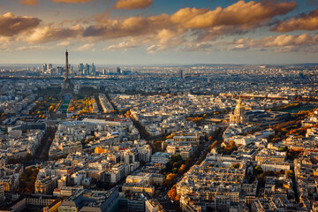 Fototapeta na wymiar Paris view from above during a spectacular autumn sunset evening from Montparnasse Tower to Tour Eiffels - amazing colors