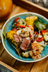Healthy food for a balanced diet rich in vitamins. Organic and regional products. Fish, surf and turf, shrimp, beef