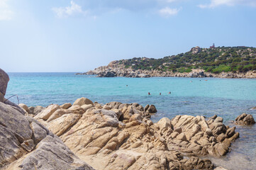 Fototapeta na wymiar Cala Cipolla beach with clear turquoise water near Chia, Sardinia island, Italy