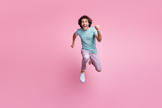 Full length photo of hurrying young gentleman wear casual outfit jumping running isolated pastel color background