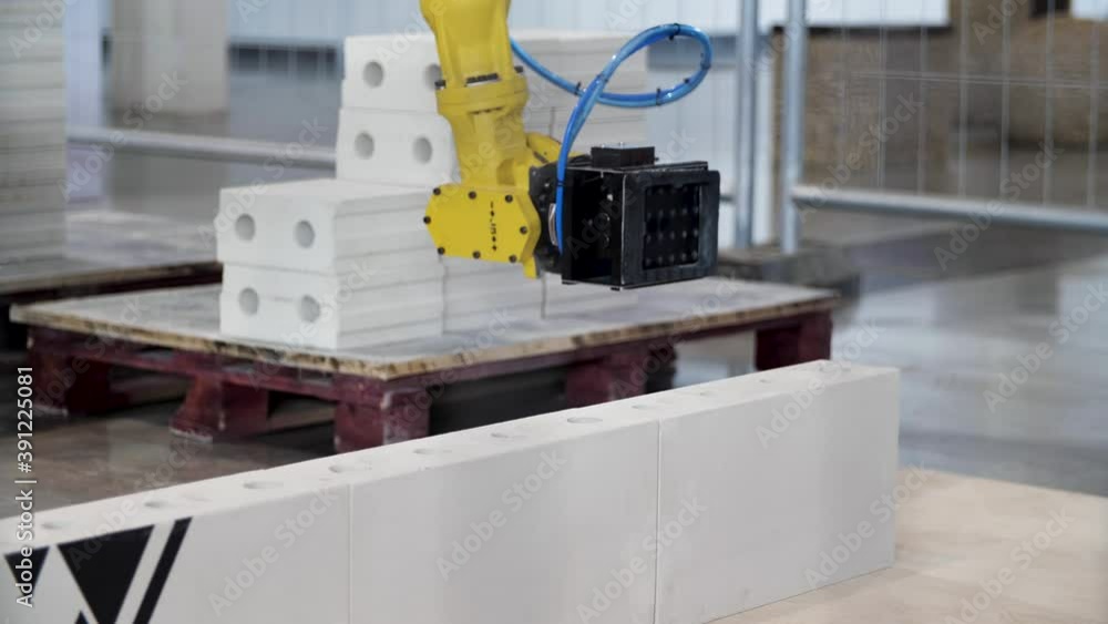 Poster industrial robot exhibit at work. media. bricklayer robot for automated building construction, conce