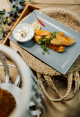 Healthy food for a balanced diet rich in vitamins. Organic and regional products. Crispy chicken, garlic dip