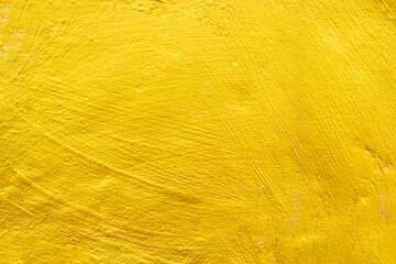 Gold concrete wall texture or background  and copy space.