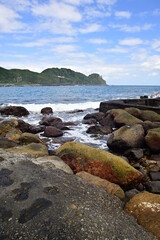 Fototapeta na wymiar Longdong Bay Promontory is the largest bay on the Northeast Coast in Taiwan. It is favored with clear water and abundant marine life, including large numbers of colorful tropical fish.