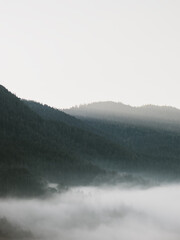 View of the foggy mountain landscape in the early morning