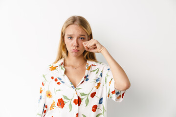 Fototapeta premium Unhappy beautiful girl crying while posing at camera