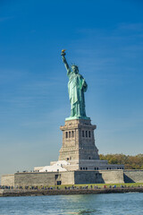 Fototapeta na wymiar Sky colors on the background of Statue of Liberty, New York City