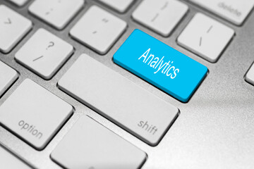 Concept of keyboard with blue button and action.