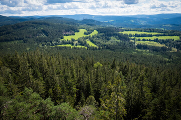 castle from view point, green fields and forest, bohemian forest, czech republic