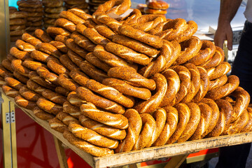 Turkish simit bread. Traditional Turkish bagel with sesame seeds sold in the streets. Turkish street food