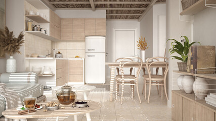 Cosy wooden sustainable kitchen and living room in beige tones with modern sofa and coffee tables. Tea time, glass teapot and teacup, snacks. Environmental friendly interior design