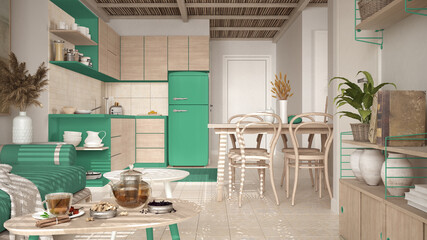Cosy wooden sustainable kitchen and living room in turquoise tones with sofa and coffee tables. Tea time, glass teapot and teacup, snacks. Environmental friendly interior design