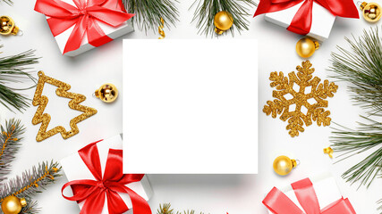 Christmas composition. White gift box with red ribbon, New Year balls and Christmas tree in xmas composition on white background for greeting card. Flat lay, top view, copy space.