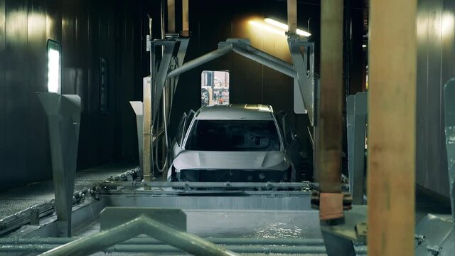 Automobile body is getting submerged into zinc solution