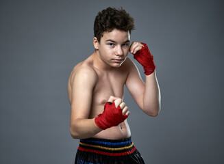 Teenage kickboxer training
