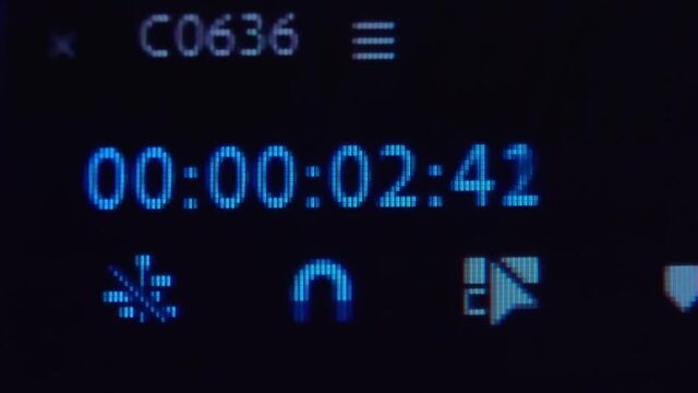 the time in blue numbers is counted in the timecode, while the Director works with the video sequence in the program on a black macro monitor