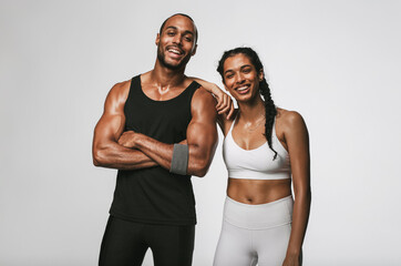 Portrait of smiling fitness couple