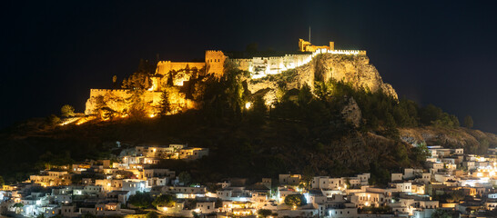panoramic view of Lindos, town, fortress and Acropolis. Night photography. Rhodes, Greece