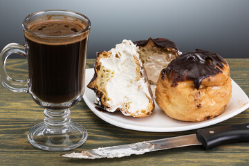 chocolate cakes with white delicate cream and hot black coffee is wonderful
