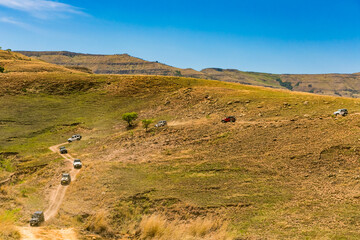  Jeep 4x4 Vehicles on a Dirt Road in the Drakensberg