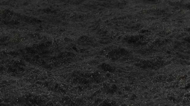 Humus compost ground copy space abstract texture background for Agroculture Farm, Vermi cultivation and growing of Mushrooms. 4K Slide 3d animation in slow motion with bio Humus soil.