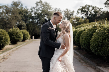 Fototapeta premium portrait of a happy bride and groom, wedding love emotions