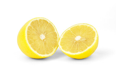 Lemon cut in half on white isolated background.
