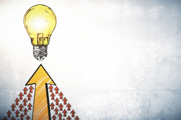 Abstract drawing light bulb and arrows on concrete wall.