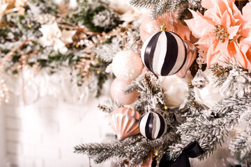 Festive Christmas wallpaper with Christmas ball tree and holiday decoration. Bright greeting card christmas bokeh background and design