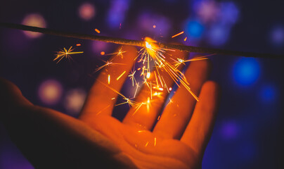 Man catches sparks new year mood holidays christmas