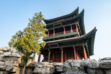 Fototapeta premium In autumn, ancient building lofts and ginkgo trees are in Jinci Park, Taiyuan, Shanxi, China