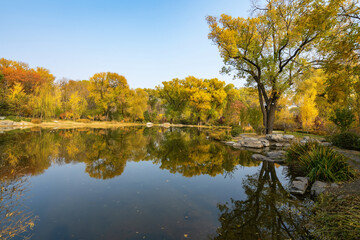 In autumn, ancient building lofts and ginkgo trees are in Jinci Park, Taiyuan, Shanxi, China