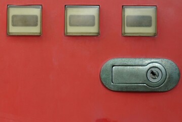 Close-up a master key lock of a vintage vending machine.
