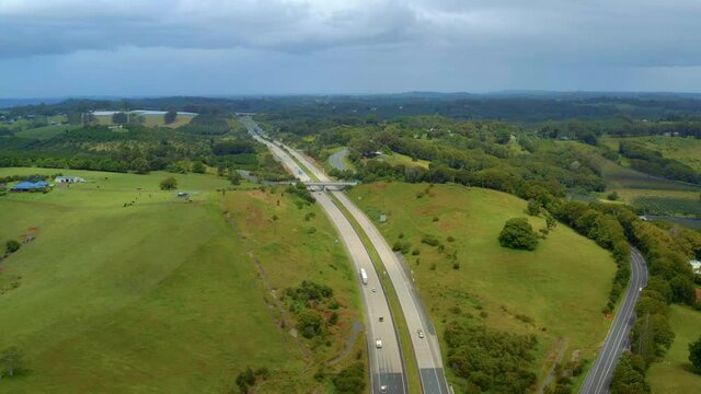 Vehicles Driving At The Pacific Motorway In Brisbane, Australia On A Sunny Day - aerial